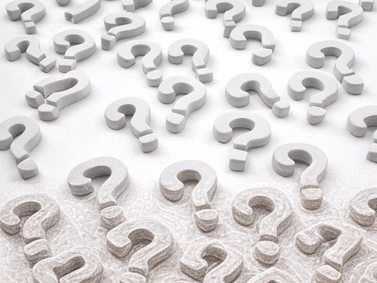 Numerous 3D question marks symbolizing AI innovation challenges