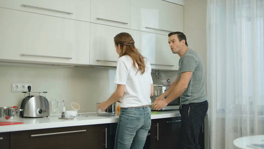 Couple in kitchen appearing to argue, representing the concept of 'Argue with Karen AI Free - ChatGPT Personal AI' software for fun interactions.
