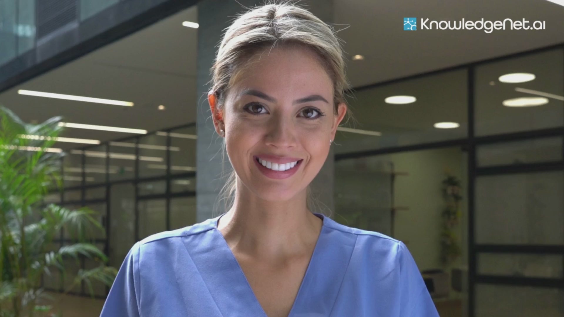 Smiling professional in scrubs representing KnowledgeNet.ai Sales Leads Tools - Custom Platform (Paid) Business AI software for healthcare sales insights.