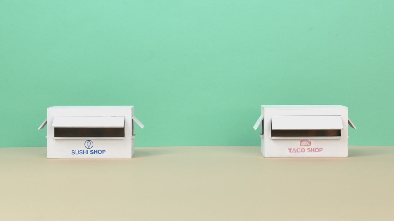 Looka AI Logo and Brand Design - Custom Platform (Paid) Business AI showcasing minimalist branding for Sushi Shop and Taco Shop on white storefront models.